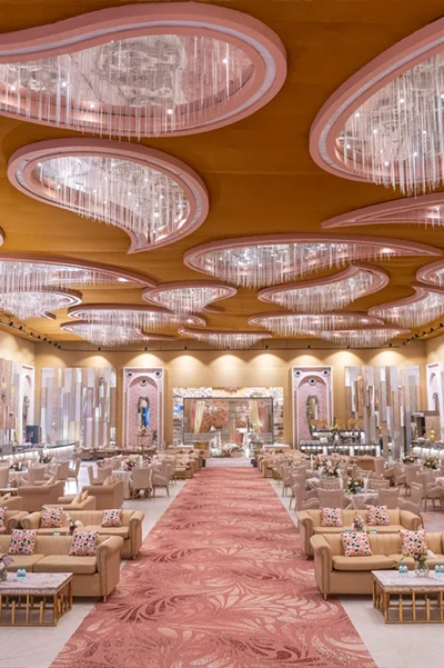 Home 7 Imperial Hall reception aisle with crystal chandeliers and mandap stage at Mallu Farms, Chattarpur